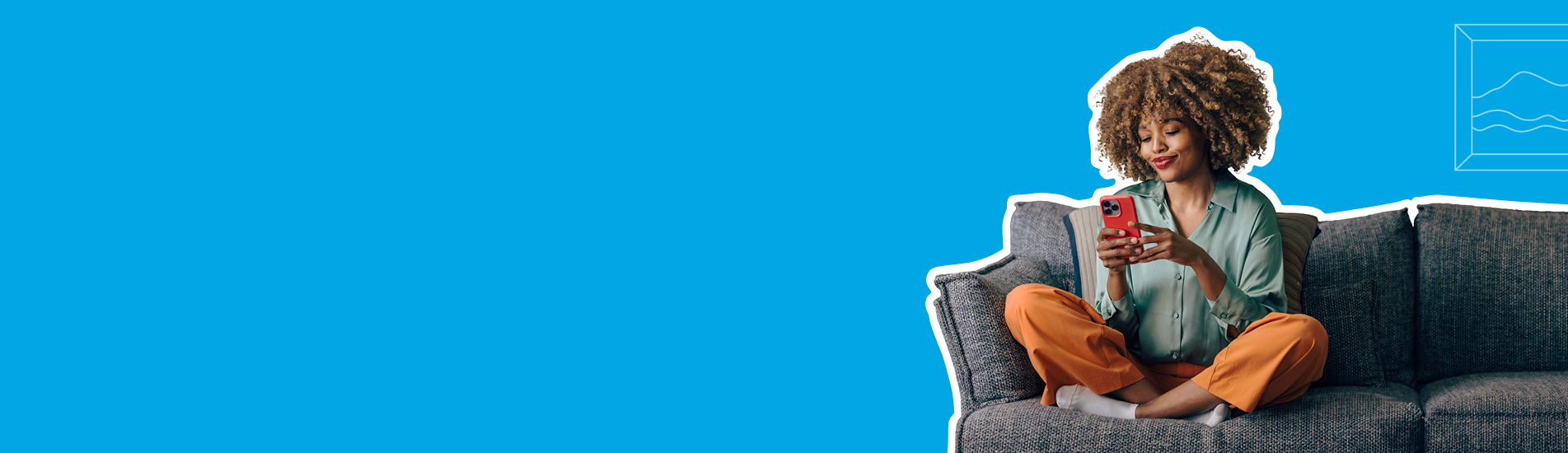 young woman sitting on a comfy chair using her smartphone